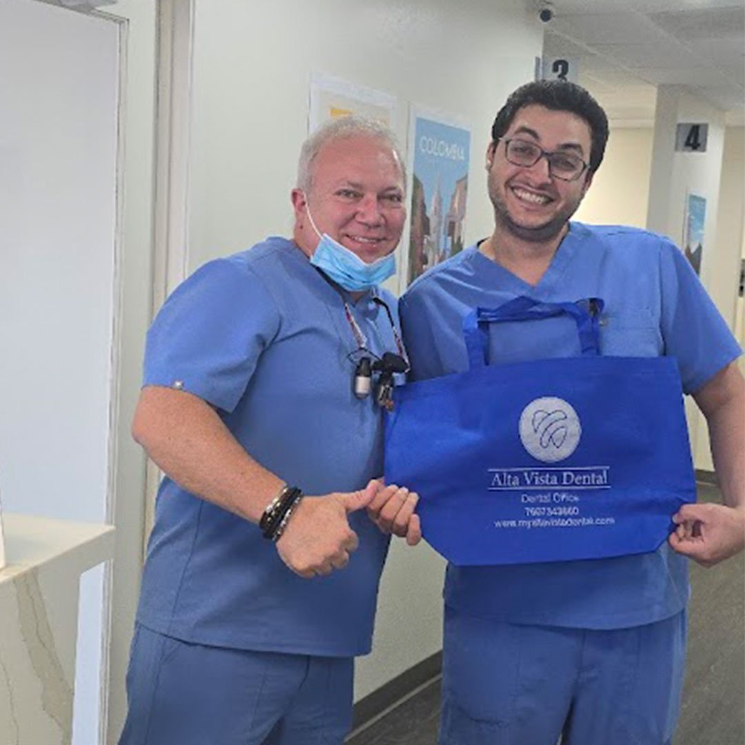 An expert dentist in Vista CA discussing an affordable dental treatment plan with a patient.