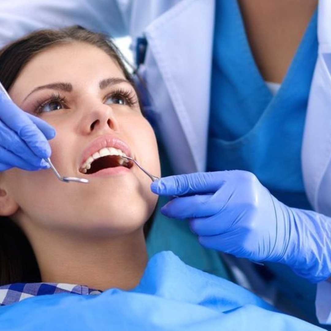 A patient receiving a free dental exam at Alta Vista Dental, the top choice for a Medi-Cal dentist and emergency dentist in Vista, CA.